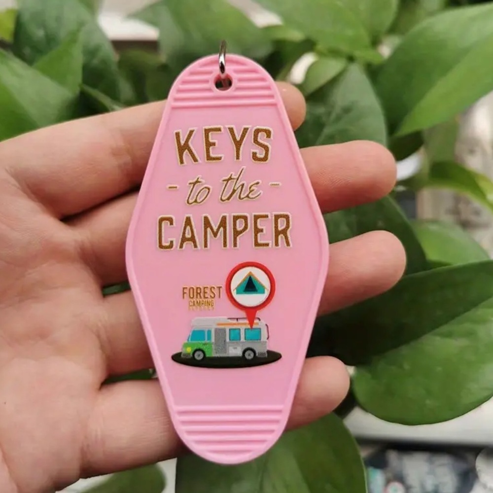 Pink Motel Keychain that says “Keys to the Camper” Brand NEW